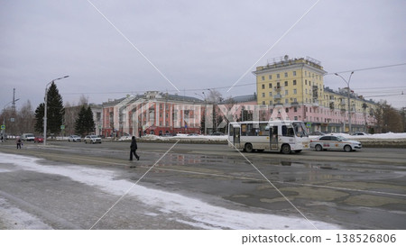 March 22 2026 Barnaul Russia view from Sovetov Square toward Veterans Square covered in snow cold early spring cityscape urban architecture and winter atmosphere. March 22 2026 Barnaul Russia view from Sovetov Square toward Veterans Square covered in snow cold early spring cityscape urban architecture and winter atmosphere. 138526806