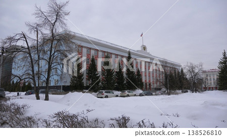 March 22 2026 Barnaul Russia Altai Krai Governor and Government Administration building at Sovetov Square covered in snow cold early spring cityscape urban architecture and winter atmosphere. March 22 2026 Barnaul Russia Altai Krai Governor and Government Administration building at Sovetov Square covered in snow cold early spring cityscape urban architecture and winter atmosphere. 138526810