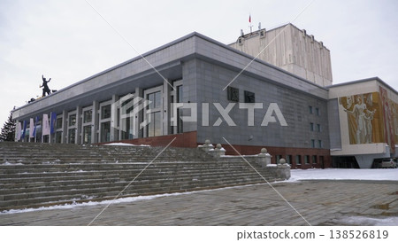 March 22 2026 Barnaul Russia Altai Regional Drama Theatre named after V M Shukshin covered in snow cold early spring cityscape urban architecture and winter atmosphere. March 22 2026 Barnaul Russia Altai Regional Drama Theatre named after V M Shukshin covered in snow cold early spring cityscape urban architecture and winter atmosphere. 138526819