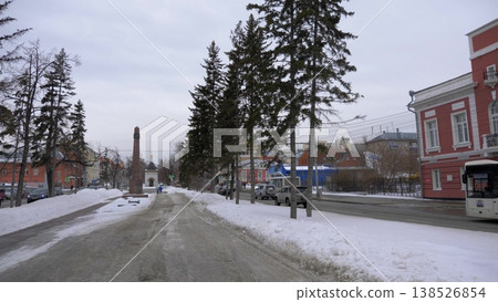 March 22 2026 Barnaul Russia Fallen Fighters for Socialism Monument and city administration building covered in snow cold early spring cityscape urban architecture and winter atmosphere. March 22 2026 Barnaul Russia Fallen Fighters for Socialism Monument and city administration building covered in snow cold early spring cityscape urban architecture and winter atmosphere. 138526854