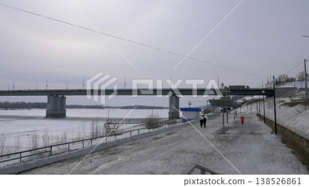 March 22 2026 Barnaul Russia new bridge over Ob River covered in snow cold early spring cityscape urban architecture and winter atmosphere. 138526861