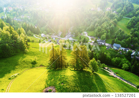 Calm idyllic village in Slovenian mountains at sunrise, summer travel concept Calm idyllic village in Slovenian mountains at sunrise, summer travel concept 138527201
