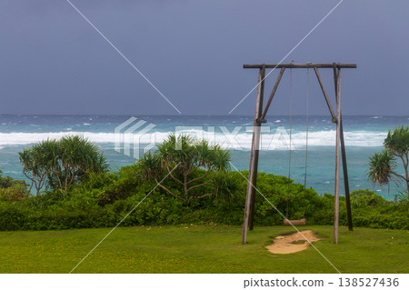 A solitary wooden swing on the beach of Ikejima Island, Okinawa 138527436