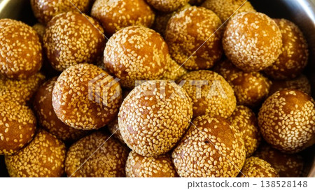 close up of many Chinese traditional festival snacks deep fried Sesame Ball (Jiandui) close up of many Chinese traditional festival snacks deep fried Sesame Ball (Jiandui) 138528148