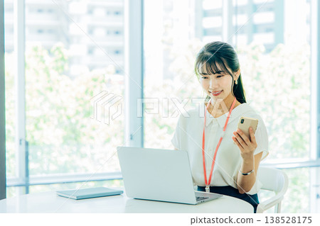 A woman working in an office A woman working in an office 138528175