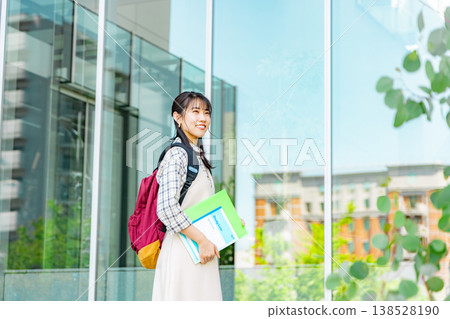 University students walking through an office building University students walking through an office building 138528190