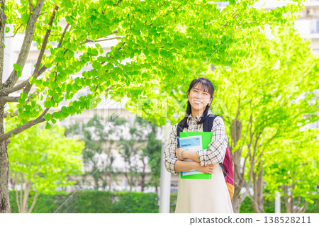 Female college student walking on campus Female college student walking on campus 138528211