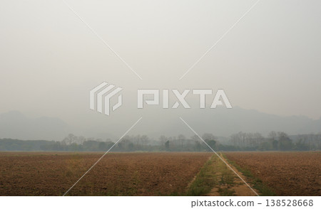 Hazy Border Mountain Range Under Smoke Blanket Hazy Border Mountain Range Under Smoke Blanket 138528668