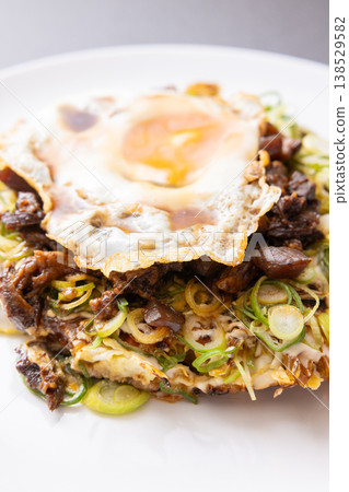 Delicious Kujo green onion and beef tendon okonomiyaki 138529582