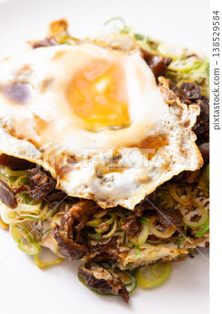 Delicious Kujo green onion and beef tendon okonomiyaki Delicious Kujo green onion and beef tendon okonomiyaki 138529584