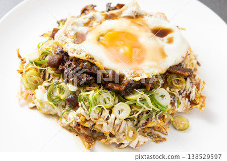 Delicious Kujo green onion and beef tendon okonomiyaki 138529597