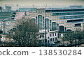 Lyon cityscape with Halle Tony Garnier concert hall and urban buildings in hazy daylight 138530284