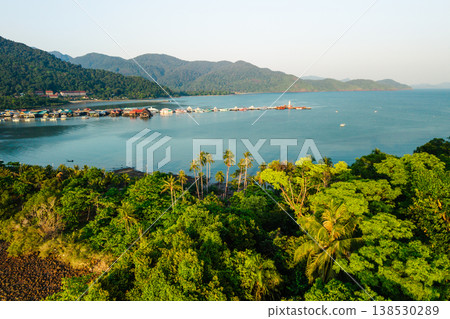Aerial view of Bang Bao fishing village and pier, Ko Chang island, Thailand. Traditional coastal community with mountai 138530289