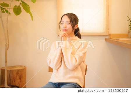 Daughter prays for the deceased at home. Daughter prays for the deceased at home. 138530357