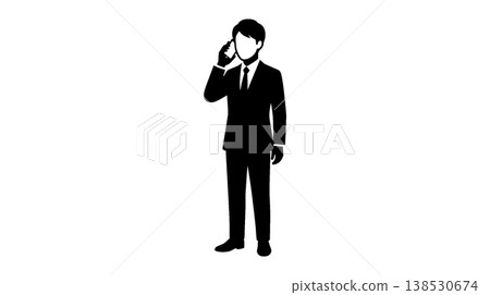 Silhouette of a man in a suit making a phone call 138530674