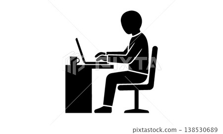 Silhouette of a person working on a laptop 138530689