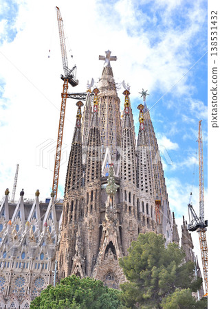 The Sagrada Familia with a cross installed. The Sagrada Familia with a cross installed. 138531432
