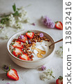 bowl of yogurt with strawberries, granola and honey, generative ai 138532416