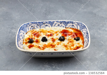 Smoky Roasted Eggplant Salad with Creamy Yogurt Sauce, Topped with Olives and Olive Oil Meze Appetizer Smoky Roasted Eggplant Salad with Creamy Yogurt Sauce, Topped with Olives and Olive Oil Meze Appetizer 138532564