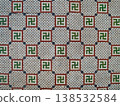 Swastika symbol in ancient mosaic decoration. 138532584