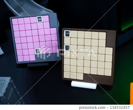 3D printed art object. Object printed on 3D printer from melted colored plastic. Model in shape board puzzle games created on 3D printer from threads of molten plastic. Modern additive technologies 138532857