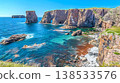 Majestic Coastal Cliffs with Dramatic Rock Formations and Vibrant Blue Sea on a Sunny Day 138533576