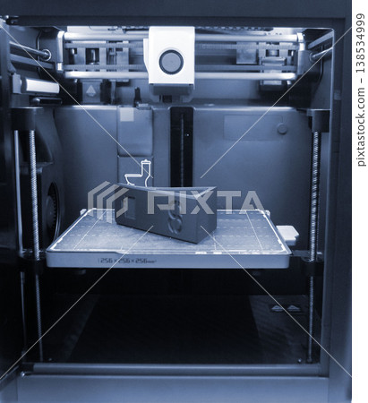 3D printed art object. Object printed on 3D printer from melted black plastic. Model created on 3D printer from threads of molten plastic inside 3D printer. Modern additive progressive technologies 3D printed art object. Object printed on 3D printer from melted black plastic. Model created on 3D printer from threads of molten plastic inside 3D printer. Modern additive progressive technologies 138534999