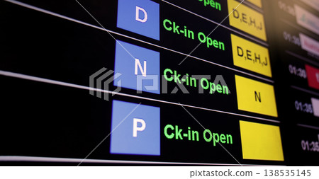 Airport display board. Airport departure information board displaying boarding gate open check in status and cancelled flights. Ideal for travel aviation tourism delay and transportation concepts. Airport display board. Airport departure information board displaying boarding gate open check in status and cancelled flights. Ideal for travel aviation tourism delay and transportation concepts. 138535145