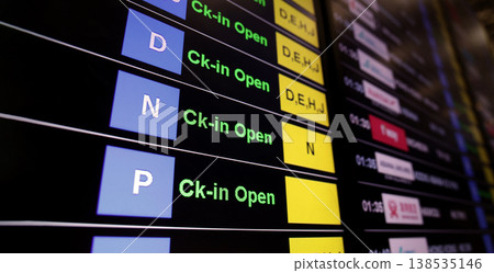 Airport display board. Airport departure information board displaying boarding gate open check in status and cancelled flights. Ideal for travel aviation tourism delay and transportation concepts. Airport display board. Airport departure information board displaying boarding gate open check in status and cancelled flights. Ideal for travel aviation tourism delay and transportation concepts. 138535146