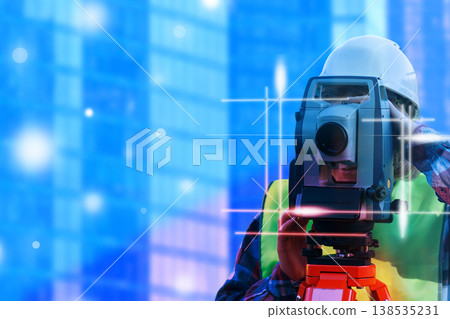 The engineer employed theodolite instruments while working on the construction site to conduct route surveys for the construction of a bridge across the intersection, aiming to alleviate traffic The engineer employed theodolite instruments while working on the construction site to conduct route surveys for the construction of a bridge across the intersection, aiming to alleviate traffic 138535231