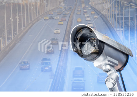Surveillance camera dominates foreground, sleek and modern 138535236