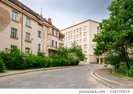 uzhhorod, ukraine - 03 jun 2012: urban scenery in summertime. view from hoidy street near park of st. tetyany with paved walkways. location near narodna square. cobbled street of uzhgorod city uzhhorod, ukraine - 03 jun 2012: urban scenery in summertime. view from hoidy street near park of st. tetyany with paved walkways. location near narodna square. cobbled street of uzhgorod city 138535654