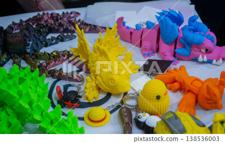 3D printed many different art objects. Objects printed on 3D printer from melted colored plastic. Models created on 3D printer from threads of molten plastic. Modern additive progressive technologies 3D printed many different art objects. Objects printed on 3D printer from melted colored plastic. Models created on 3D printer from threads of molten plastic. Modern additive progressive technologies 138536003