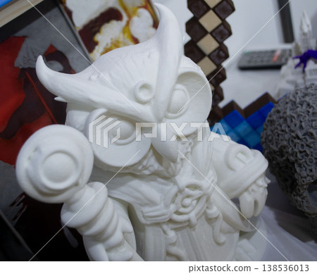 3D printed different art objects. Objects printed on 3D printer from melted colored plastic. Model white owl created on 3D printer from threads of molten plastic. Modern new additive technologies 3D printed different art objects. Objects printed on 3D printer from melted colored plastic. Model white owl created on 3D printer from threads of molten plastic. Modern new additive technologies 138536013
