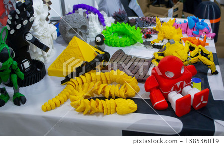 3D printed many different art objects. Objects printed on 3D printer from melted colored plastic. Models created on 3D printer from threads of molten plastic. Modern additive progressive technologies 3D printed many different art objects. Objects printed on 3D printer from melted colored plastic. Models created on 3D printer from threads of molten plastic. Modern additive progressive technologies 138536019