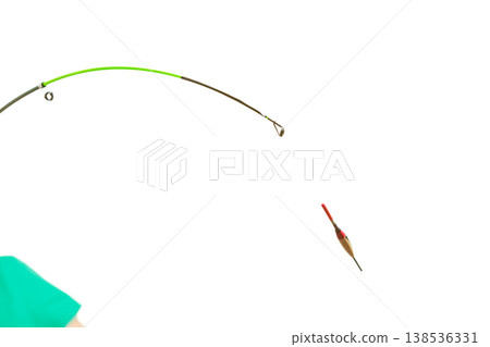 Person holding fishing rod, spinning equipment. 138536331