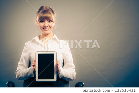 Woman with tablet. Blank screen copy space. 138536431