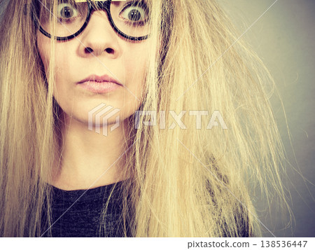 Closeup of woman thinking face expression Closeup of woman thinking face expression 138536447