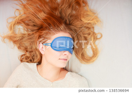 Sleeping woman wearing blindfold sleep mask. 138536694