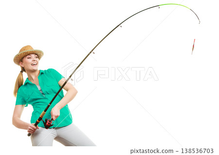 Woman with fishing rod, spinning equipment 138536703