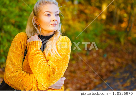 Fashion woman walking in autumn park Fashion woman walking in autumn park 138536970