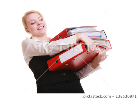 Paperwork. Businesswoman carrying stack of documents 138536971