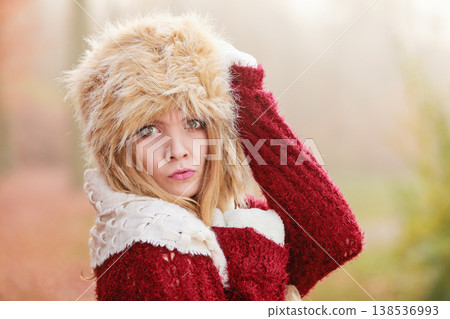 Pretty fashion woman in fur winter hat. Pretty fashion woman in fur winter hat. 138536993