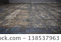 Low angle pull back shot of a rough concrete floor 138537963