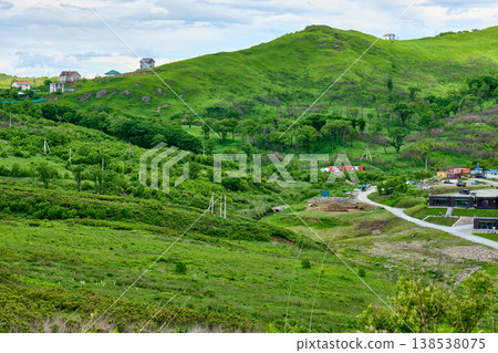 The nature of the Khasansky district of Primorsky Krai, Russia. The lip of the Teal of the Slavic Bay, the inner bay of Peter the Great in the summer. The nature of the Khasansky district of Primorsky Krai, Russia. The lip of the Teal of the Slavic Bay, the inner bay of Peter the Great in the summer. 138538075