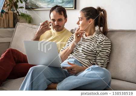 Married couple discussing family budget and planning expenses, trust and compromise in relationships Married couple discussing family budget and planning expenses, trust and compromise in relationships 138538519
