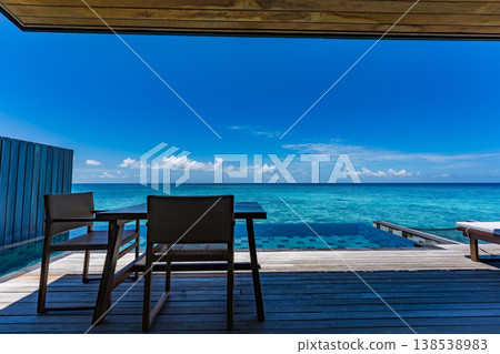 Terrace of an overwater villa with a pool in the Maldives Terrace of an overwater villa with a pool in the Maldives 138538983