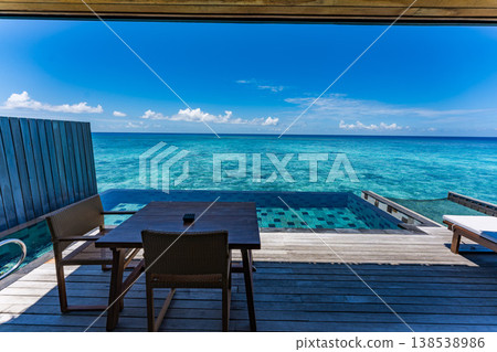 Terrace of an overwater villa with a pool in the Maldives Terrace of an overwater villa with a pool in the Maldives 138538986
