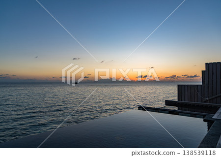 Evening view from the terrace of an overwater villa with a pool in the Maldives Evening view from the terrace of an overwater villa with a pool in the Maldives 138539118