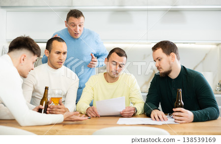 Friends comforting upset man receiving unpleasant news Friends comforting upset man receiving unpleasant news 138539169